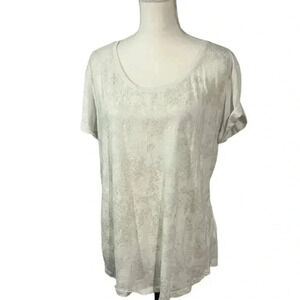 A New Approach size XL white tee with gold print on front and rolled sleeves EUC